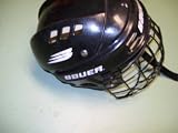 Nike-Bauer HH1000s hockey helmet with attached face/mask - size is 6 1/2 - 7 1/8
