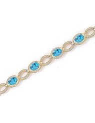14kt Yellow Gold Oval Blue Topaz Bracelet.