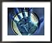 Abstract View of a Blue Hand over a Stop Watch Framed Art Poster Print, 22x18