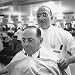 Goldman Sachs and Co. Partner Sidney Weinberg Sitting in Chair at Barber Shop Photogr...
