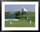 dubai creek Men on Dubai Creek Golf with Yacht Club in Distance, Dubai, United Arab Emirates Photography Framed Art Poster Print by Holger Leue, 31x25