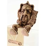 CERAMIC AMULET/Anti-Taxes Gnome [Made in Russia. Height: 4.5 inches (12 cm). Material: ceramic (clay). Hand-crafted] [A gnome holding a stack of money in one hand and making a defiant gesture with the other. This marvelous sculpture is shaped to 