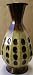 Decorative Metal Vase with Brown Spots - 17 inches tall x 9 inches in diameter - 5 inches in diameter on top - Great for fake flowers or pants - DO NOT PUT WATER IN VASE