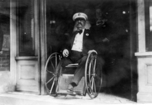 1911 Maj. Gen. Daniel E. Sickles in wheelchair; coming out of building. Size of photo: 6.9x10. Quali