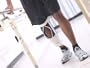Patient's Legs in Knee Brace Walking on Physical Therapy Equipment Photographic Poster Print, 24x18