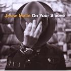 Click here to buy On Your Sleeve by Jesse Malin .