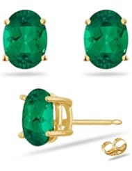 3.40 Cts of 9x7 mm AAA Oval Russian Lab Created Emerald Stud Earrings in 14K Yellow Gold