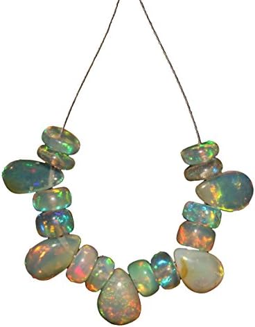 7.10 TCW Natural Ethiopian welo Fire Opal Almonds &amp; Roundel Beads Demi strand 81AZ98