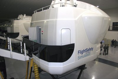 Wallmonkeys Peel and Stick Wall Decals - The Th-1h Weapons System Trainer Full Motion Flight Simulators. - 18W x 12H Removable Graphic