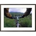 Expedition Members Pedal Their Way Through Lake Clark National Park, Alaska Framed Photographic Poster Print by Bill Hatcher, 29x21