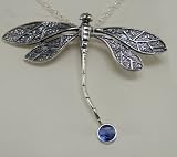 A Beautiful Dragonfly in Sterling Silver Accented with Genuine Siberian Blue Quartz