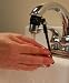 Smart Faucet- One Touch Water Saving Control Valve with Aerator and Adapter to Fit ALL Bathroom Faucets. Literally Saves 80+% of the Water Used in the Bathroom Sink! Black/Chrome