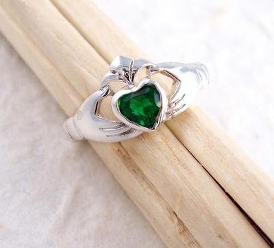 Click here to buy Sterling Silver Claddagh Emerald Green Crystal Ring, Size 6.