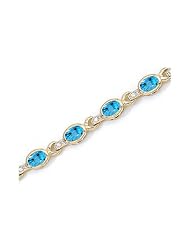 10K Yellow Gold Oval Blue Topaz and Diamond Bracelet