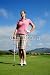 Wallmonkeys Peel and Stick Wall Decals - Young Woman Holding Golf Club on Green - Removable Graphic