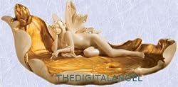 medieval fairy laying quietly in shell french style sculpture/statue