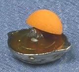 Miniature Orange Juice Squeezer with Half an Orange