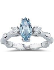 0.20 Cts Diamond & 0.88 Cts Aquamarine Three Stone Ring in 14K White Gold