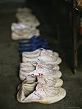 Shoes Lined up Alongside Beds of Kung Fu Students at Ta Gou Academy Photographic Poster Print, 12x16