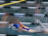 A Swimmer Races Through the Water at a Swimming Competition National Geographic Collection Photographic Poster Print by Michael S. Lewis, 24x18