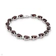 Bracelet With 25.05ctw Genuine Garnets Crafted in White Gold. Total item weight 12.8g Length 7.5in