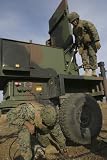 Wallmonkeys Peel and Stick Wall Decals - Marines Prepare the Antenna of an An/tpq-46a Radar System. - 24