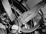 Waist Gunner Robert G. Nichols Manning His 50 Cal. Machine Gun in the American B-17 Little Bill Photographic Poster Print by Margaret Bourke-White, 16x12