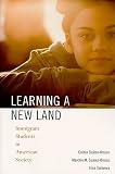 Learning a New Land: Immigrant Students in American Society   [LEARNING A NEW LAND] [Paperback]