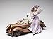 Lady in Purple Dress and Hat with Dog in Antique Car Figurine