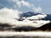Kluane Mountains Framed by Drifting Cloud Art Photographic Poster Print by Mark Newman, 32x24