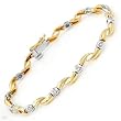 Bracelet With Genuine Diamonds Beautifully Designed in 14K Two tone Gold. Total item weight 10.3g Length 7in