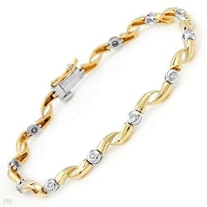 Bracelet With Genuine Diamonds Beautifully Designed in 14K Two tone Gold. Total item weight 10.3g Length 7in