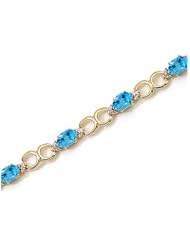 14K Yellow Gold Oval Blue Topaz and Diamond Bracelet by Jewelry Mountain