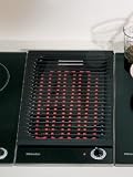 Miele KM411 11 3/8' CombiSet Electric Barbeque Cooktop with a Cast Iron Grate and a Hinged Element for Easy Cleaning