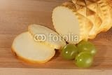 IMAGE OF Wallmonkeys Peel and Stick Wall Decals - Traditional Polish Cheese Known as Oscypek on a Wooden Board - 60