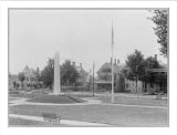 Historic Print (L): [Section of Farmington, Maine, showing monument, flag pole, and several houses]