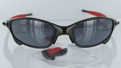 Click here to buy 12-673 - Oakley Ducati Juliet Sunglasses Carbon Frame with Black Iridium Lens by Oakley.