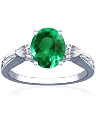 Platinum Oval Cut Emerald Ring With Sidestones