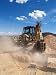 Wallmonkeys Peel and Stick Wall Decals - Backhoe Digging at a New Construction Site. Vertical - 24