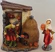 Polyresin Nativity Village - Bread Market - Two Pieces - Woman With Pottery - 5.5"x4.25"X6.25"