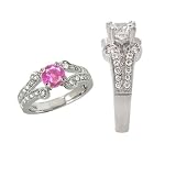 18k Chatham 6.5mm round pink sapphire color #100 engagement ring with split shank 18k Chatham 6.5mm round pink sapphire color #100 engagement ring with split shank