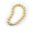 Single Strand 7-7.5 Inch 8MM Golden Shell Pearl Bracelet