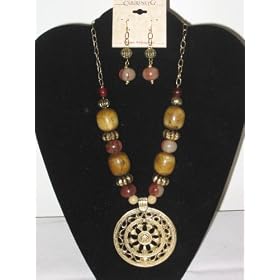 Click here to buy Lovely Wood and Glass Bead Neckace with Medallion and Matching Earrings Set by Red Hat Ladies Boutique.