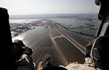 Wallmonkeys Peel and Stick Wall Decals - Airmen Fly over the Sendai Airport in Japan to Survey the Tsunami Aftermath. - 24"W x 15"H Removable Graphic