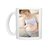 Pregnant woman listening to music Photo Mugs