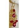 Saka's Gold Toned Acrylic Beads Chandelier Earrings