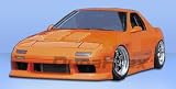 1986-1991 Mazda RX-7 M-1 Sport Complete Kit: This Complete Kit Includes M-1 Sport Front Bumper (100730), Type U Rear Bumper (100732), and Type U Side Skirts (100733).