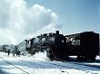 Steam Locomotive in a Snowy Trainyard, 1943 Photograph - Beautiful 16"x20" Photographic Print from the Library of Congress Collection