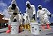 Wallmonkeys Peel and Stick Wall Decals - U.s. Soldiers from the 457th Chemical Battalion Sponge off Their Level a Protective Suits. - Removable Graphic