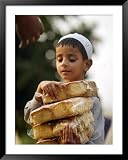 A Boy Carries Rusk as He Assists Others to Send a Consignment of Relief Supplies to Uri Photography Framed Art Poster Print, 39x49